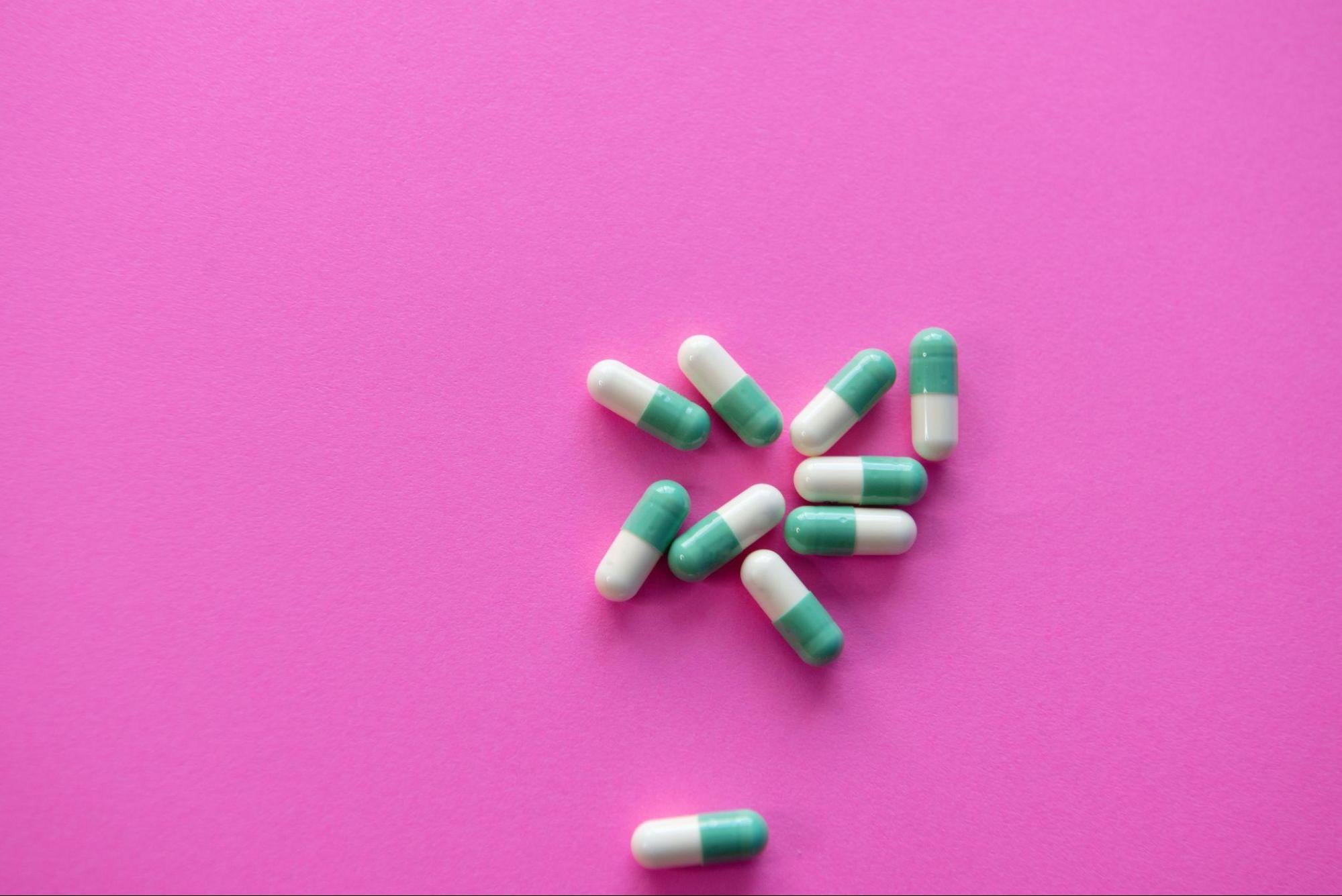 pills with a pink background