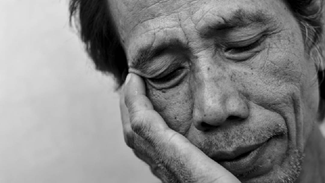 A person feeling worn down and tired in need of an energy boost. 