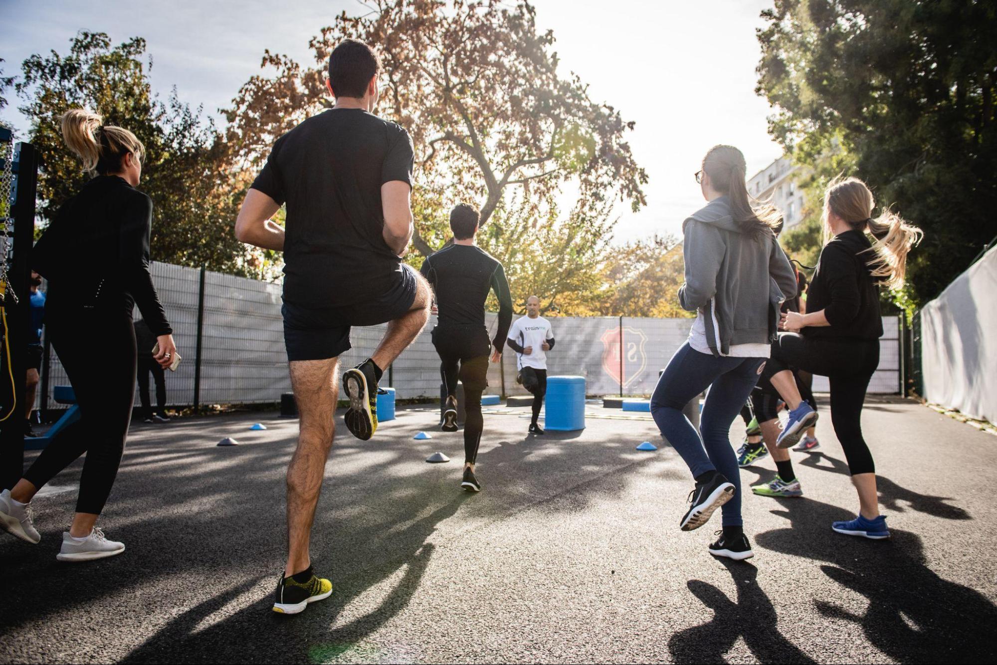  group of people exercising and doing HIIT