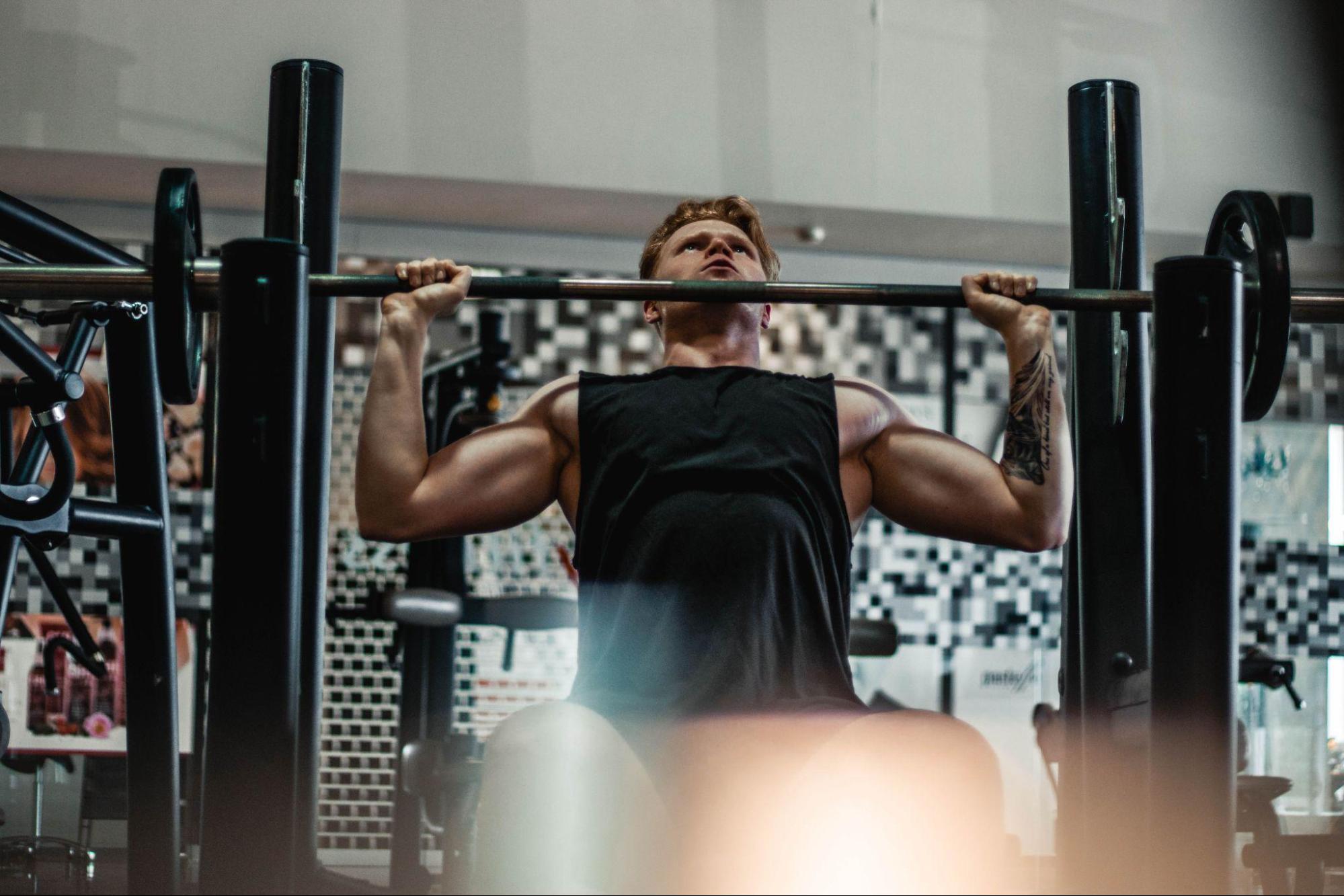  bodybuilder doing shoulder press