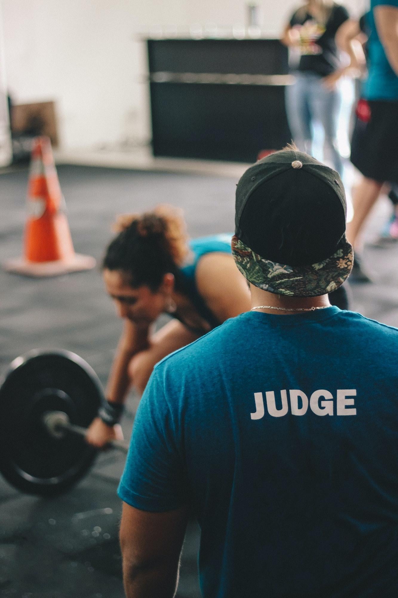 CrossFit judge watching CrossFit competitors 