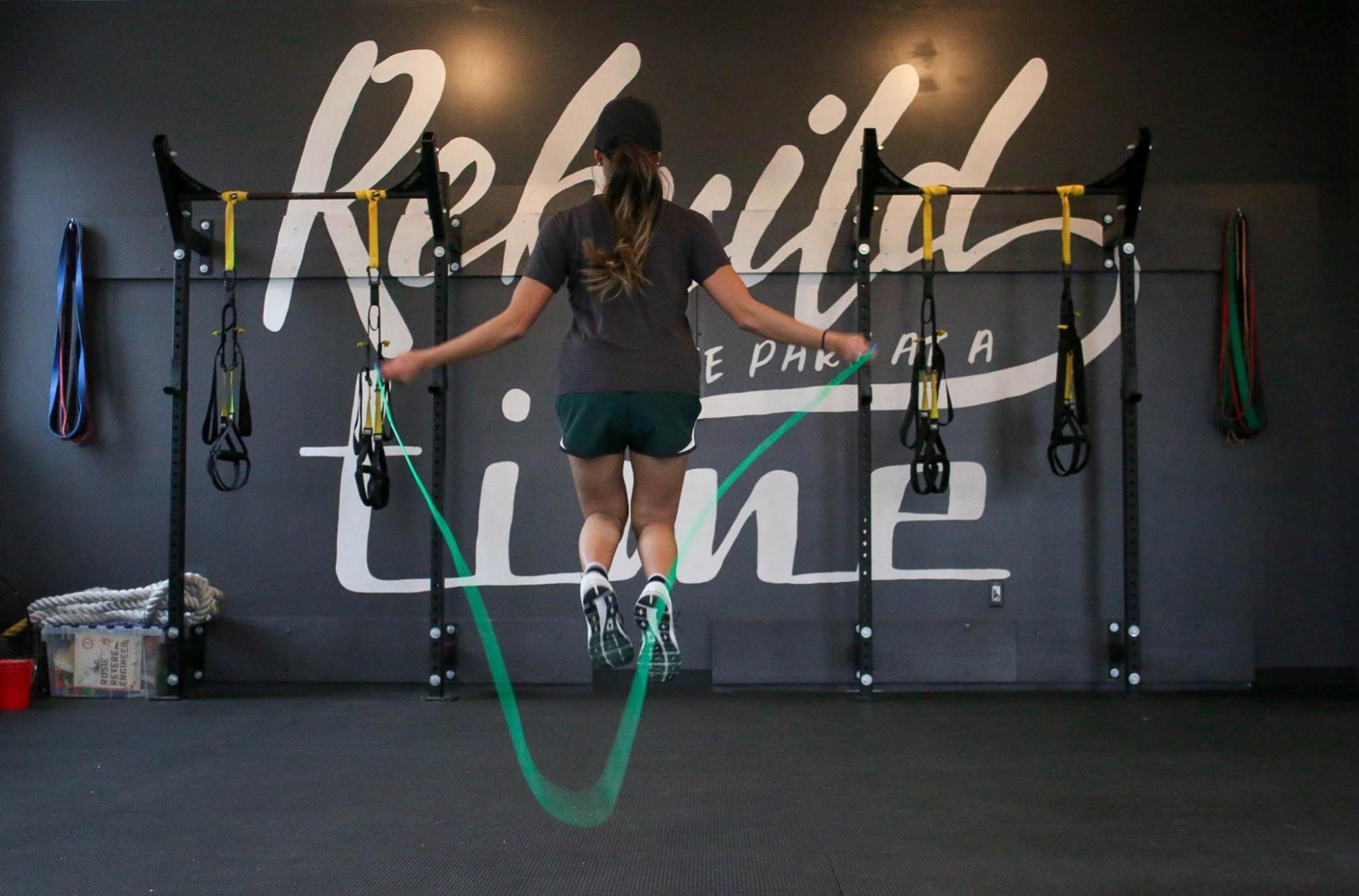 Woman jumping rope