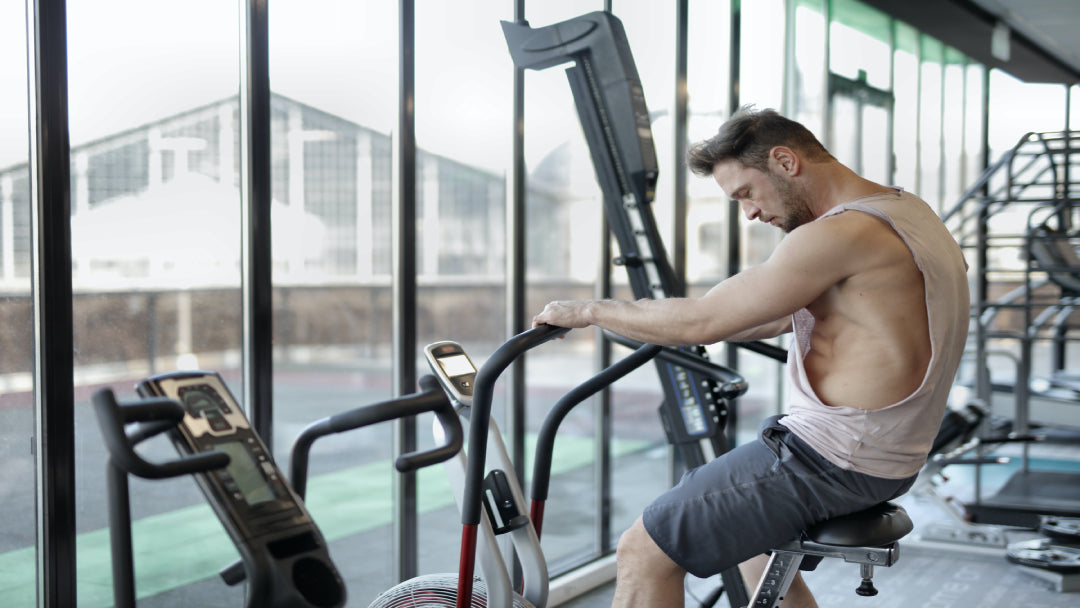 fit man using a cardio machine